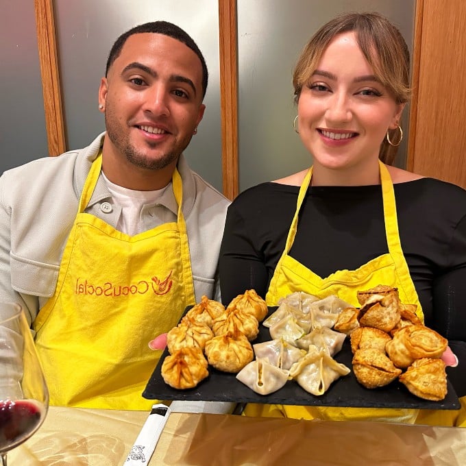 Couple with finished dumplings