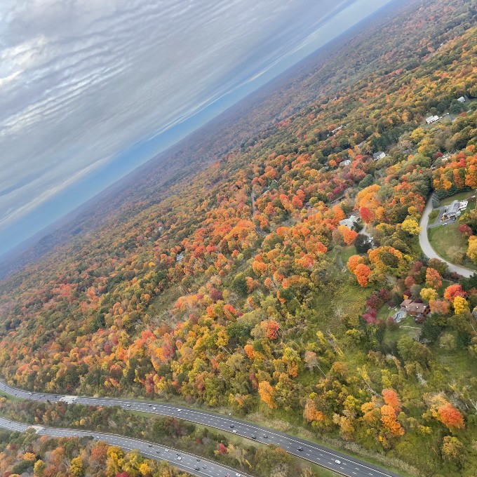 Flying over fall foliage
