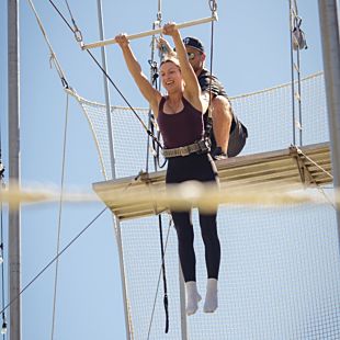 Woman on trapeze