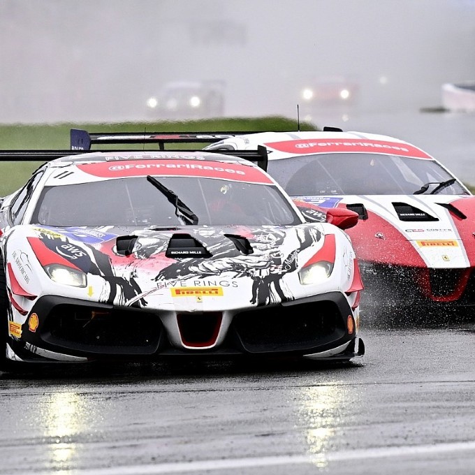 Two Sports Cars Racing