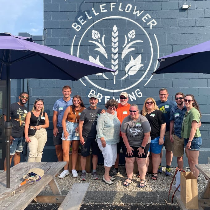 Group in front of brewery