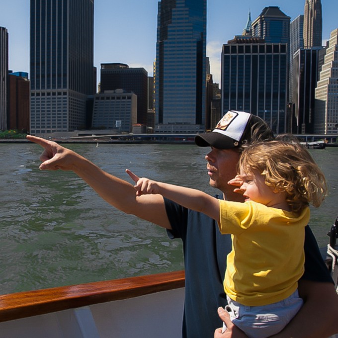 Father and son pointing