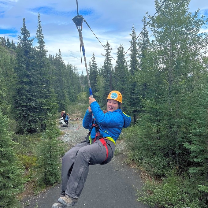 Girl on Zip Line in Trees