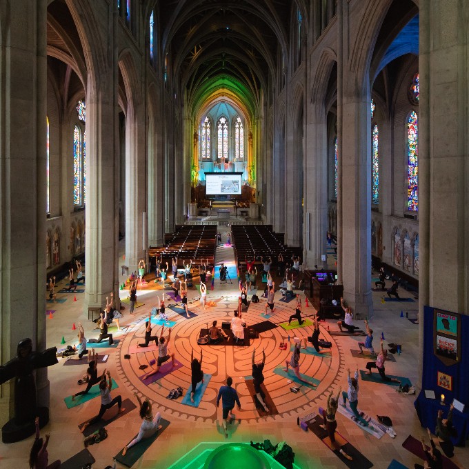 Group doing yoga in cathedral
