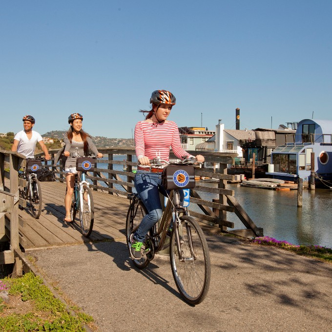 Group riding near water