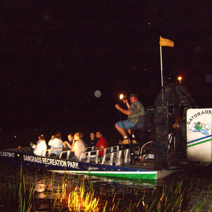 Group on boat at night