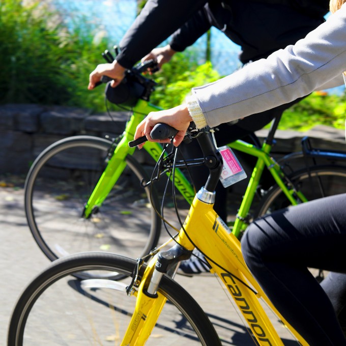 Two People Riding Bikes