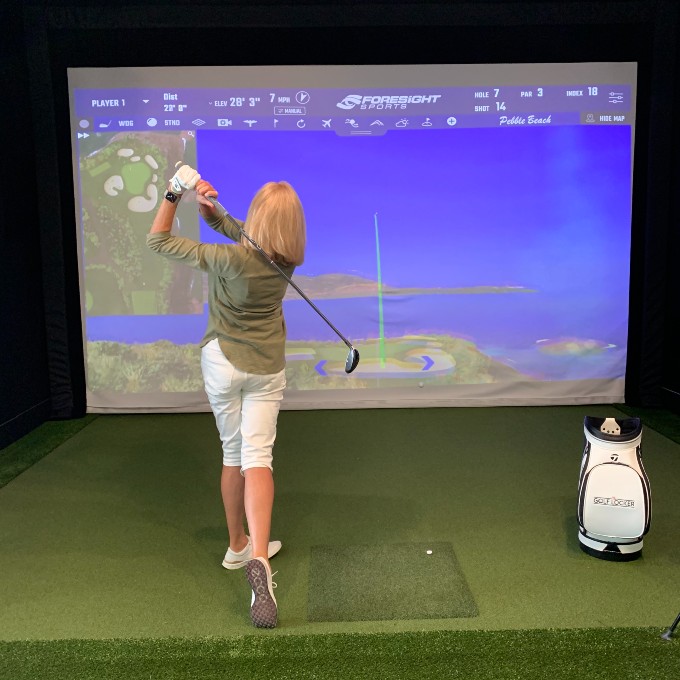 Play golf on any course with a golf simulator