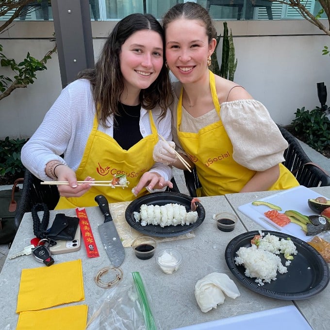 Two Girls Making Sushi