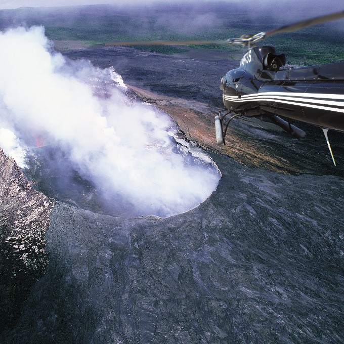 Helicopter over hole in volcano