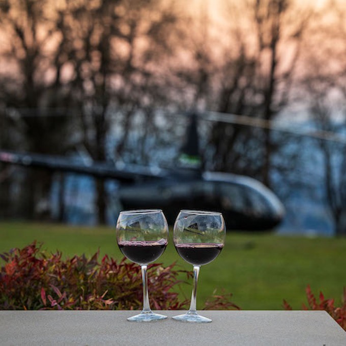 Helicopter and two glasses of wine